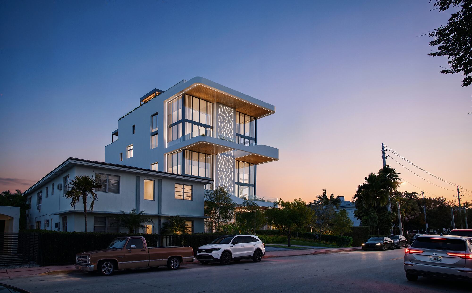 Lullaby Residences desde la calle al atardecer
